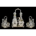 Victorian Silver Plated Cruet Stand with four glass condiments, of square form,
