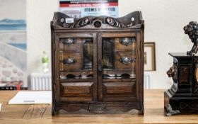1920s Oak Smoker's Cabinet, glazed doors with four inner drawers,