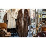 Full Length Mink Coat, shawl collar, two side slit pockets, fully lined in sateen fabric.