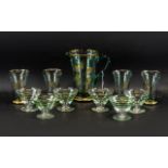 A Vintage Water Jug & Four Glasses, aqua colour glass decorated with gold leaf design,