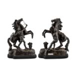 Pair of Spelter Marly Horses, depicting rearing horses and handlers, raised on ebonised base.