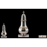 George V Splendid Sterling Silver Sugar Castor of Large Proportions with Flame Finial.