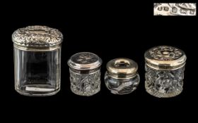 Four Edwardian Embossed Silver Cut Glass Trinket Boxes,