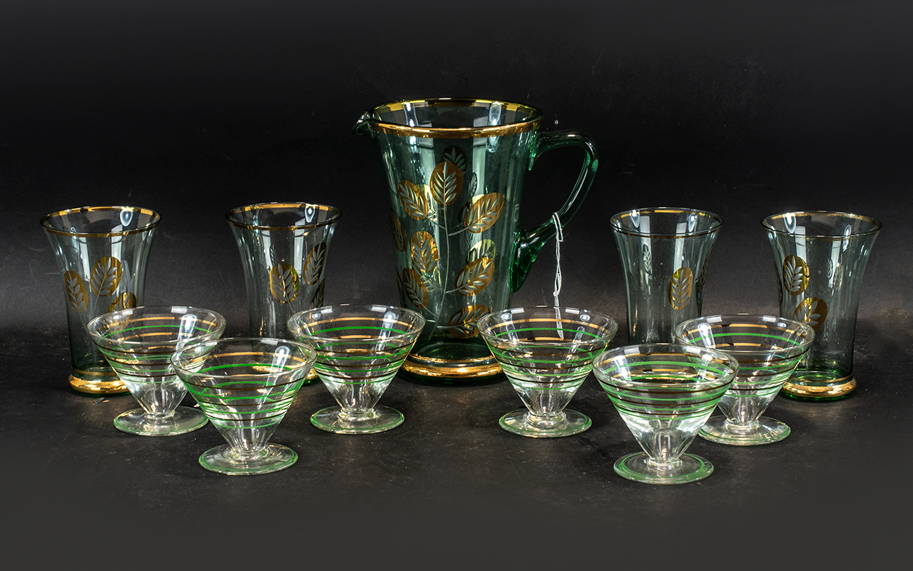 A Vintage Water Jug & Four Glasses, aqua colour glass decorated with gold leaf design, - Bild 2 aus 3