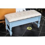 An Edwardian Painted Piano Duet Stool with upholstered seat and lift up lid.