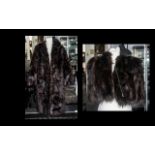 Dark Brown Fur Coat with collar and reveres, two slit pockets, fully lined in patterned sateen,