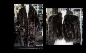 Dark Brown Fur Coat with collar and reveres, two slit pockets, fully lined in patterned sateen,