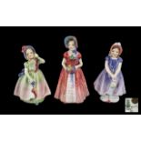 Royal Doulton Trio of Hand Painted Porcelain Small Figures.