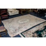 Large Beige Ground Embossed Chinese Florally Decorated Carpet; in good condition, 103 inches (257.