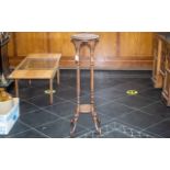 Reproduction Hardwood Pot Stand, raised on four carved legs with splayed feet, measures 39" tall,