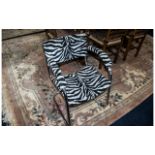 A Pel Chrome Cantilever Bauhaus Style Armchair. Covered in zebra print fabric.