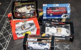 A Collection of Boxed Die Cast Model Cars, to include Premier Collection BMW, Burago Aston Martin,
