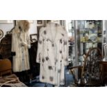 Ladies Mink Coat, full length, in cream fur with dappled spots of fawn, with collar and reveres,