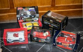 A Collection of Die Cast Boxed Model Cars to include Mira 1955 Buick, Burago Porsche 1961 Cabriolet,