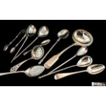 A Collection of Silver Spoons & Associated, to include a ladle, three anointing spoons, sifter,