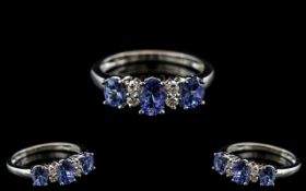 18ct White Gold Attractive Tanzanite and Diamond Set Dress Ring.