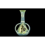 C H Brannam Art Pottery Three Handled Vase, of waisted form,