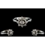 18ct White Gold - Attractive Diamond Set Cluster Ring - Flower head Setting. Marked 18ct to Interior