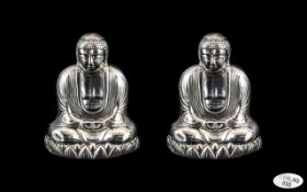 Unusual Silver Buddha Salt and Pepper Set, with Buddha seated on a lotus base; stamped Sterling 950,