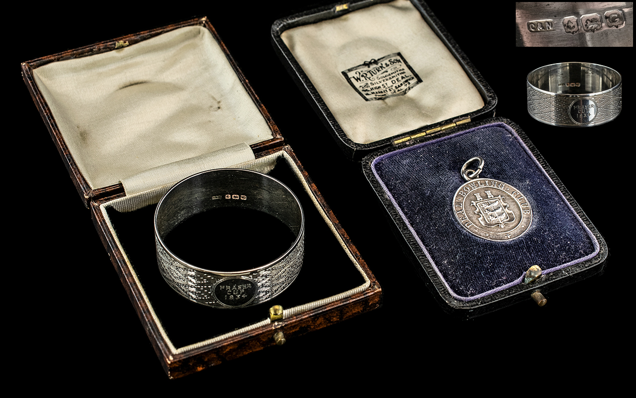 A Silver Bowling Medal, marked Deal Bowling Club, hallmarked Birmingham A 1925, in a fitted case.