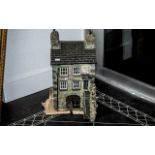 Cumbrian School Miniature House, traditionally built in stone and slate, realistically modelled.