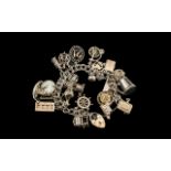 Heavy Silver Vintage Charm Bracelet Loaded with Lots of Rare and Unusual Silver Charms.