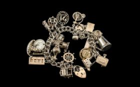 Heavy Silver Vintage Charm Bracelet Loaded with Lots of Rare and Unusual Silver Charms.