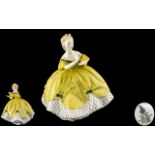 Royal Doulton Figure 'The Last Waltz' HN 2315, of an elegant lady dressed in yellow,