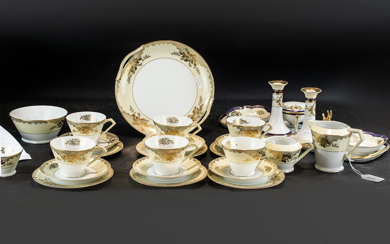 Noritake Tea Service, comprising Milk Jug, Sugar Bowl, Creamer and Sugar Bowl, Six Tea Cups, Saucers