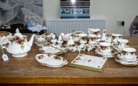 Old Country Roses Tea Service with extras, comprising a Tea Pot, Milk Jug, Sugar Bowl, four cups,