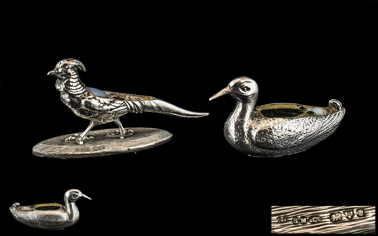 A Silver Novelty Adapted Pin Cushion in the form of a duck,