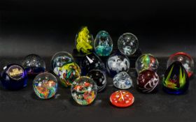 Collection of Modern Paperweights, assorted colours and designs, 17 in total.