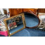 Two Wall Mirrors, comprising a square mirror with gilt pierced frame, 23" x 20",