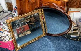 Two Wall Mirrors, comprising a square mirror with gilt pierced frame, 23" x 20",