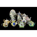 A Collection of Porcelain to include three enamelled tea pots marked Trade Aid,