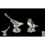 Bing and Grondahl Superb Quality Pair of Hand Painted Porcelain Bird Figures.