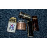 Collection of Five Cigarette Lighters, assorted styles.