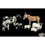 Collection of Beswick Farm Animals, comprising a Donkey No. 2267, manufactured between 1970 and
