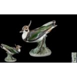 Bing and Grondahl Superb Quality Hand Painted Porcelain Bird Figure 'Green Crested Lapwing'.