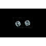 Sky Blue Topaz Stud Earrings, 5cts of sky blue topaz over two round cut solitaires,