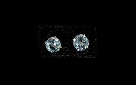 Sky Blue Topaz Stud Earrings, 5cts of sky blue topaz over two round cut solitaires,