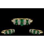 18ct Gold - Attractive Emerald and Diamond Set Dress Ring.