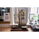 Antique Brass Shop Counter Scales, probably by Avery, the pans supported by a shaped central column,