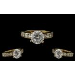 14ct Gold CZ Dress Ring, set with a central faceted stone, CZ set shoulders, fully hallmarked,