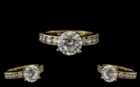 14ct Gold CZ Dress Ring, set with a central faceted stone, CZ set shoulders, fully hallmarked,