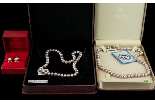 ( 2 ) Boxes of Cultured Coloured Pearls of Matched Sizes with Clasps. 15 Inches In length, With a