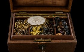 Leather Box containing a miscellaneous selection of vintage and costume jewellery