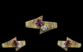 18ct Gold - Attractive and Contemporary Designed Ruby and Diamond Set Two Stone Ring.