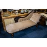 Victorian Chaise Longue in traditional style, with mahogany legs and sides.