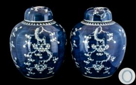 Pair of Antique Chinese Porcelain Blue and White Ginger Jars of ovoid shape, with lids,